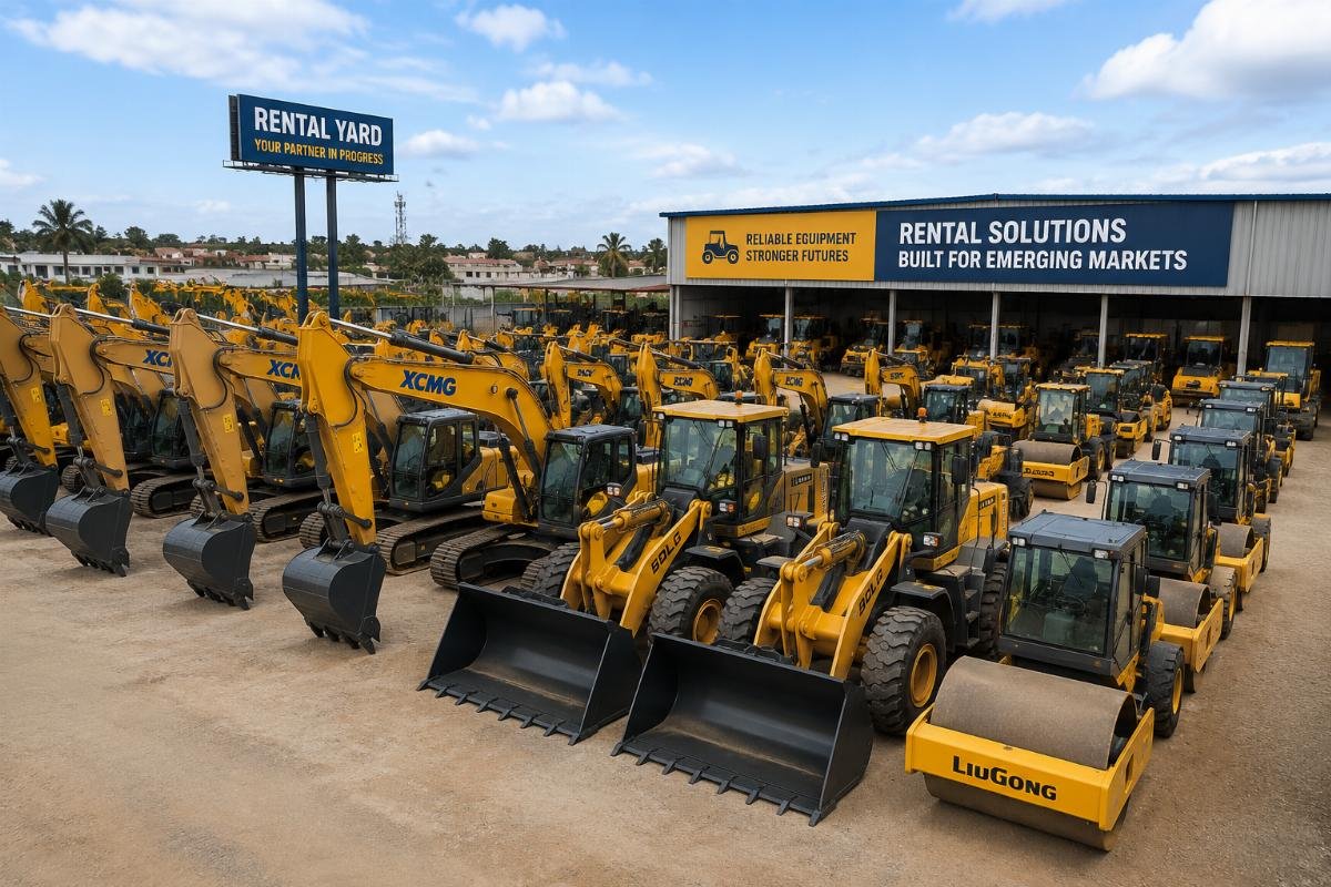 A fleet of standardized construction equipment staged at a regional rental yard in an emerging market