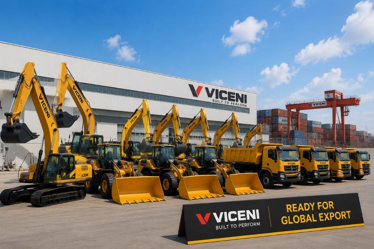 A fleet of mixed construction vehicles including excavators, wheel loaders and dump trucks staged at a factory loading yard